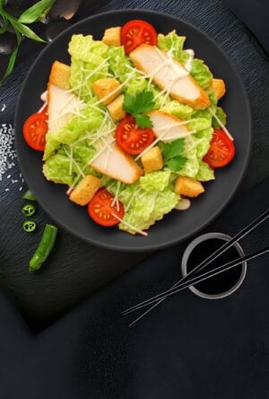 Caesar salad with chicken and bacon