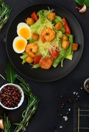Caesar salad with bacon and shrimp