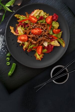 Salad with cherry tomatoes and veal