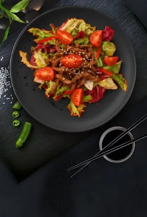 Salad with cherry tomatoes and veal